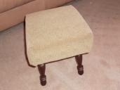 Fitted fabric-covered footstool