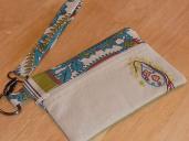 Hand-embroidered wristlet