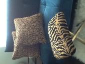 Cheetah print pillows/Tiger print stool